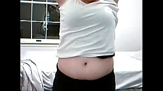 Obese Unsubtle Kim Jacks atop Webcam